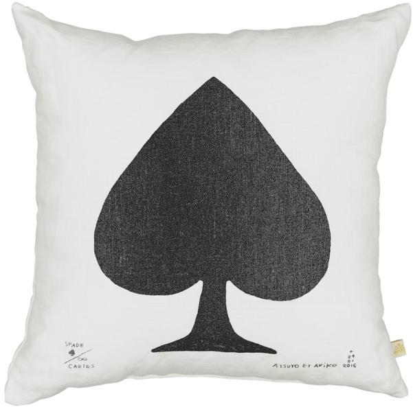 A Pillow With A Black And White Pillow