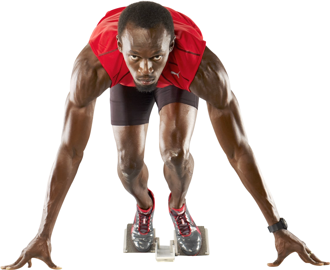 A Man In A Red Shirt On A Starting Block