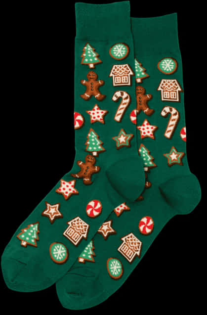 A Pair Of Green Socks With Gingerbread Cookies On Them