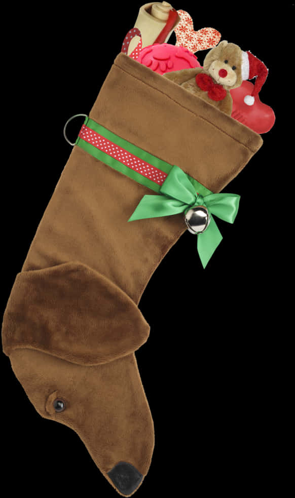 A Brown Christmas Stocking With A Green Bow And Bell