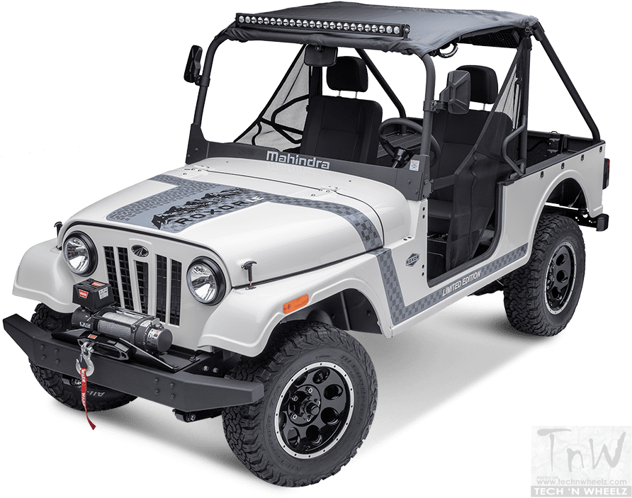 A White Jeep With Black Stripes