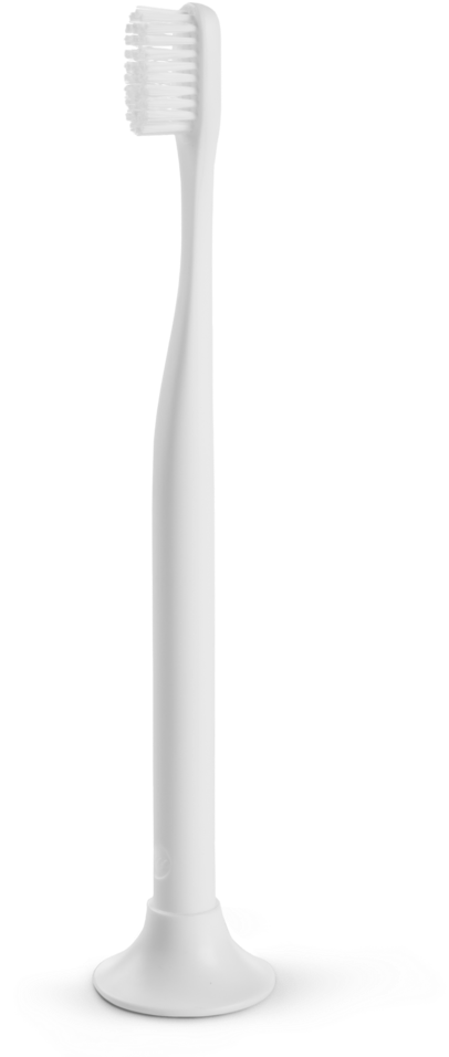 A White Toothbrush With A Black Background
