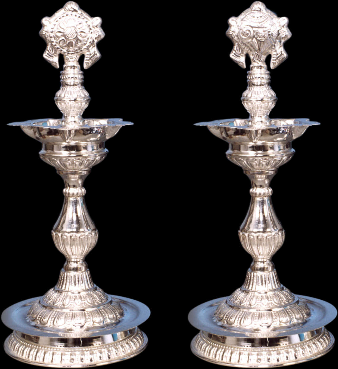 A Pair Of Silver Candlesticks