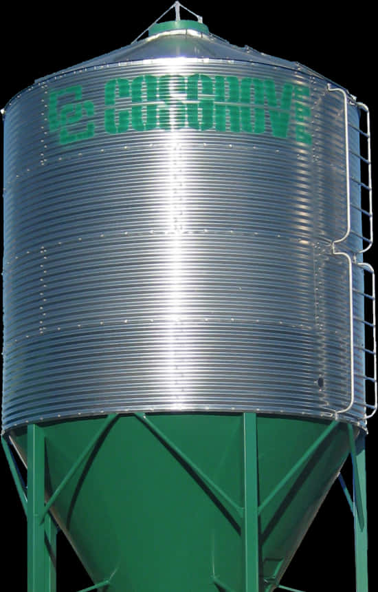 A Large Metal Silo With Green Text