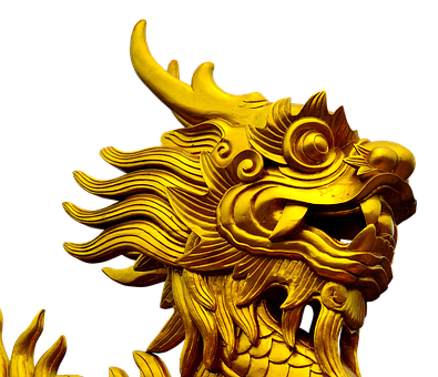 A Gold Dragon Statue With A Black Background