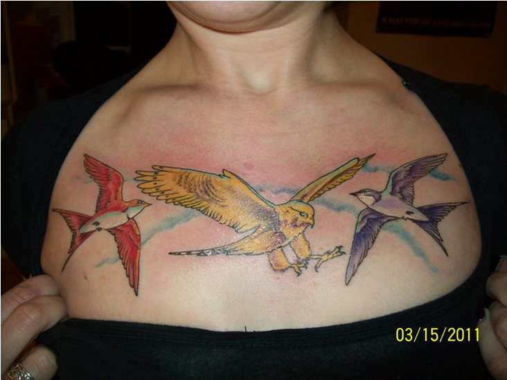 A Chest Tattoo Of Birds