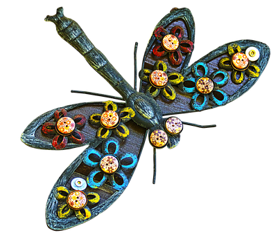 A Dragonfly Made Of Metal With Colorful Buttons