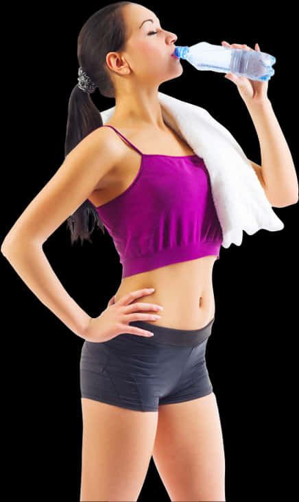 A Woman In A Purple Top And Black Shorts With A Towel Around Her Neck