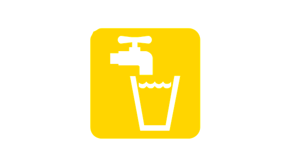 A Yellow Sign With A Faucet And A Glass