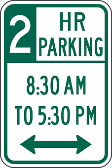 A Sign With Text And Arrows