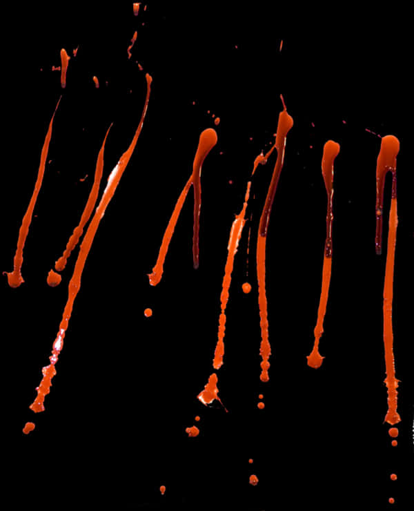 A Group Of Orange Paint Splatters