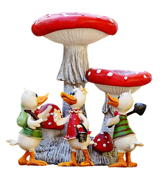 A Group Of Ducks Standing Next To A Mushroom