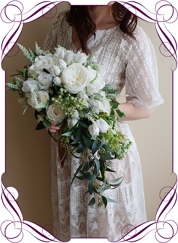 A Woman Holding A Bouquet Of White Flowers