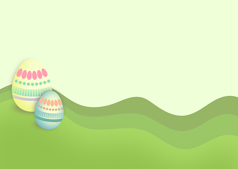 A Pair Of Painted Eggs On A Green Hill