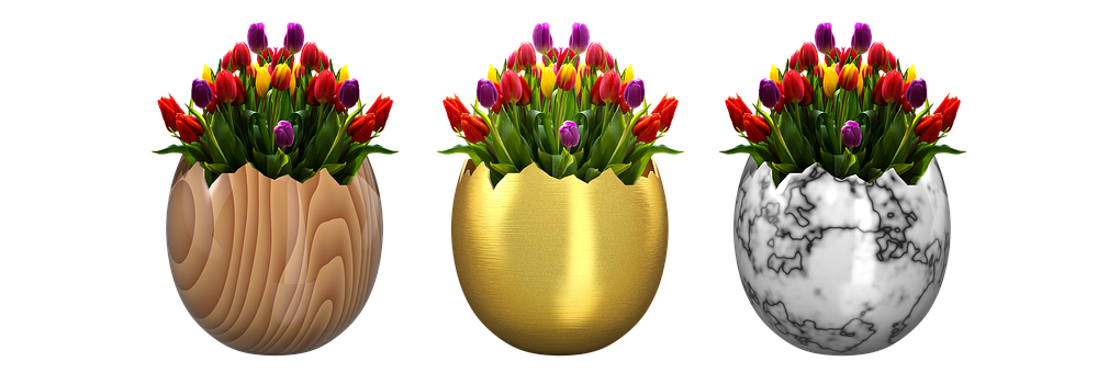 A Group Of Flowers In A Gold Egg