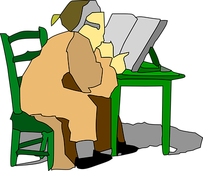 A Person Sitting At A Green Desk