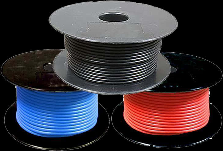 A Group Of Spools Of Wire
