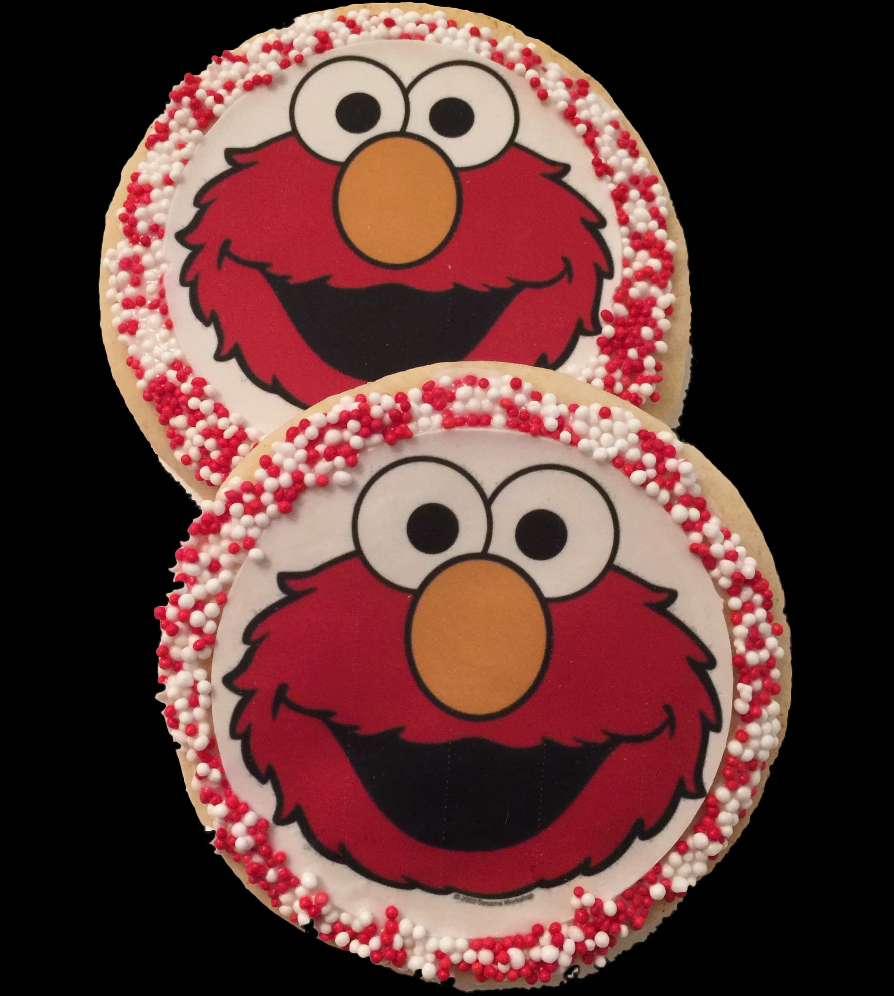 A Pair Of Cookies With A Red Face