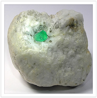 A Rock With A Green Gem
