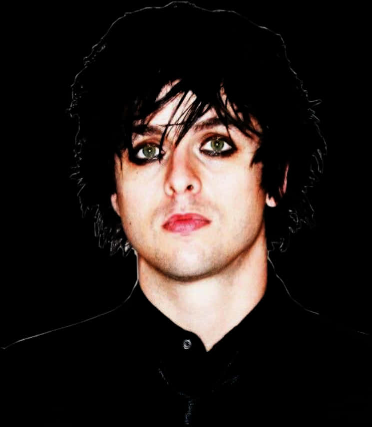 A Man With Black Hair And Green Eyes