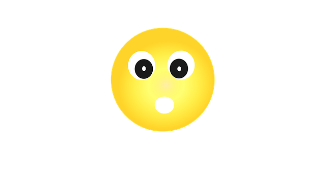 A Yellow Face With Black Eyes And A Black Background