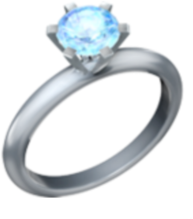 A Silver Ring With A Blue Gem