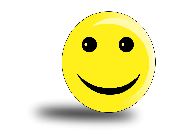 A Yellow Smiley Face With Black Eyes And A Black Background