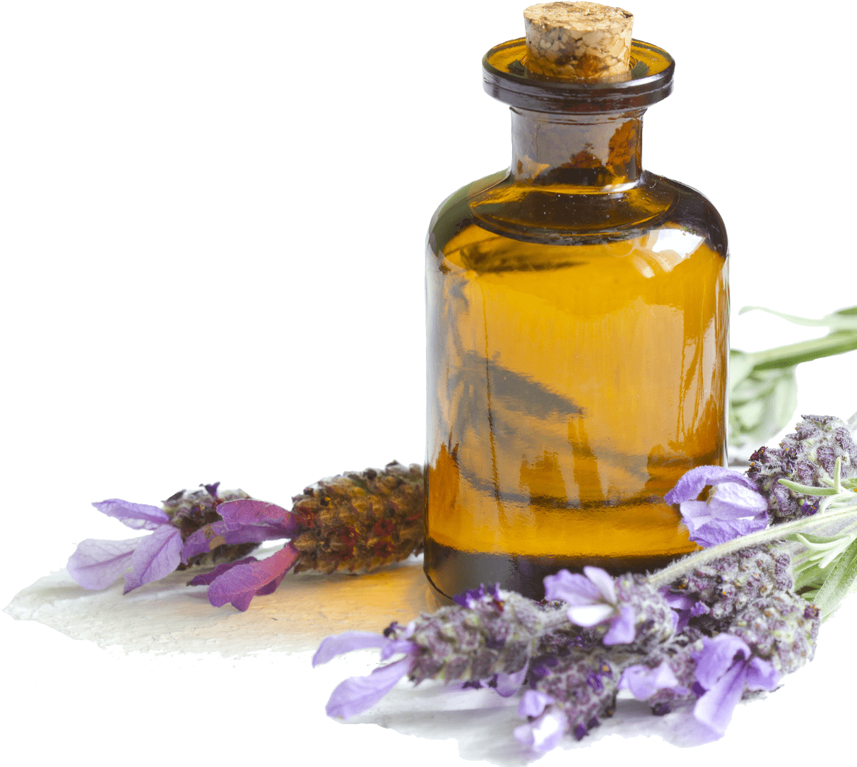 A Bottle Of Essential Oil Next To Purple Flowers