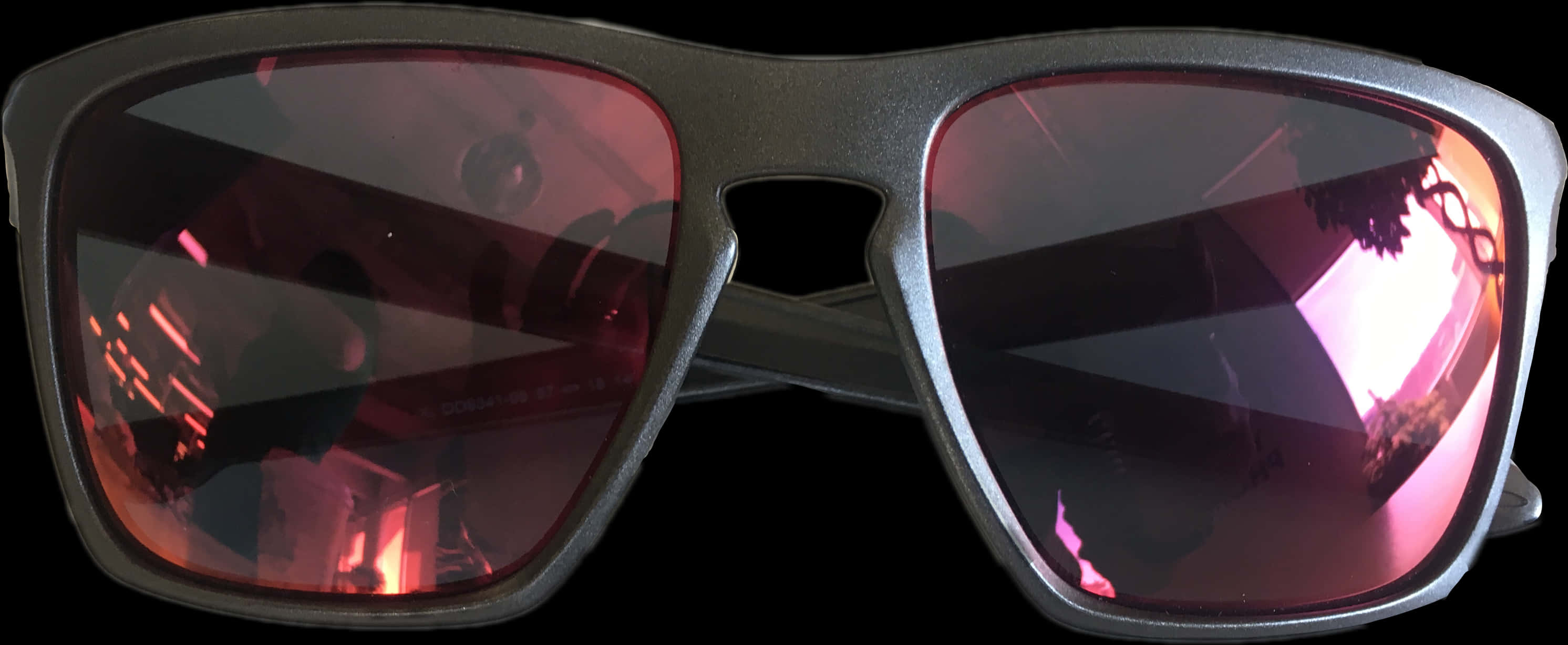 A Pair Of Sunglasses With Pink Lenses