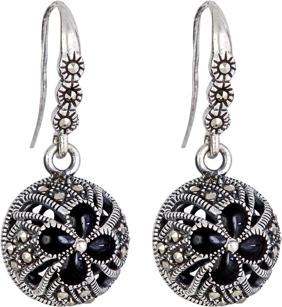 A Pair Of Earrings With Black Stones