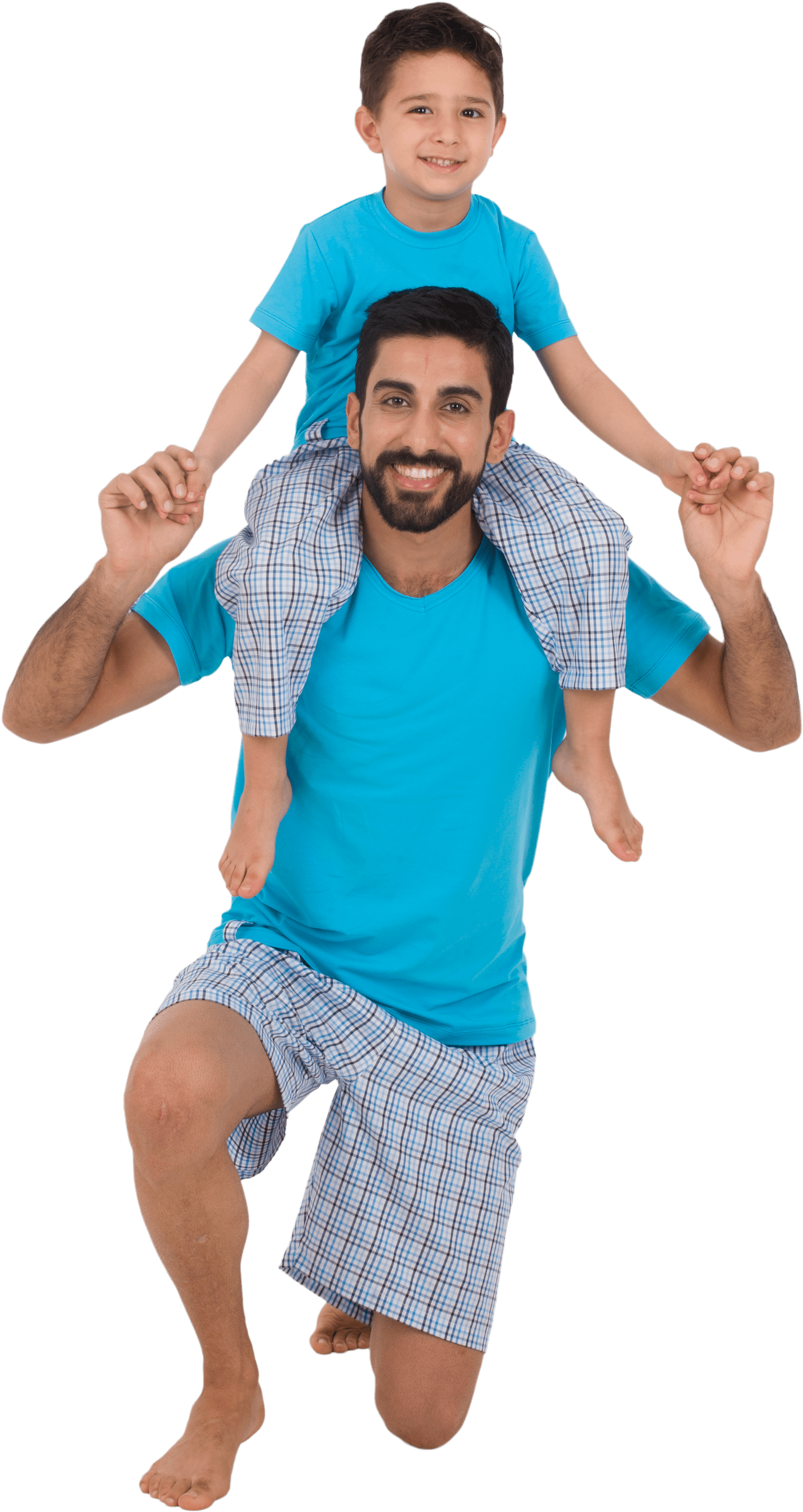 A Man Carrying A Child On His Shoulders