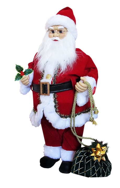 A Santa Claus Doll Holding A Bag Of Presents