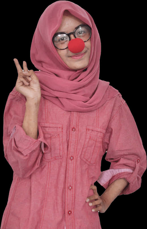 A Woman Wearing A Red Clown Nose And Glasses