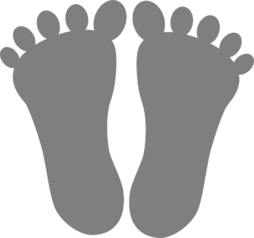 A Pair Of Feet On A Black Background