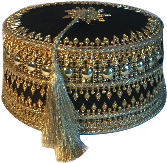 A Black And Gold Hat With Tassels