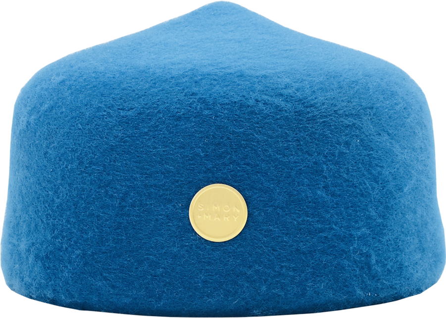 A Blue Hat With A Gold Circle On It