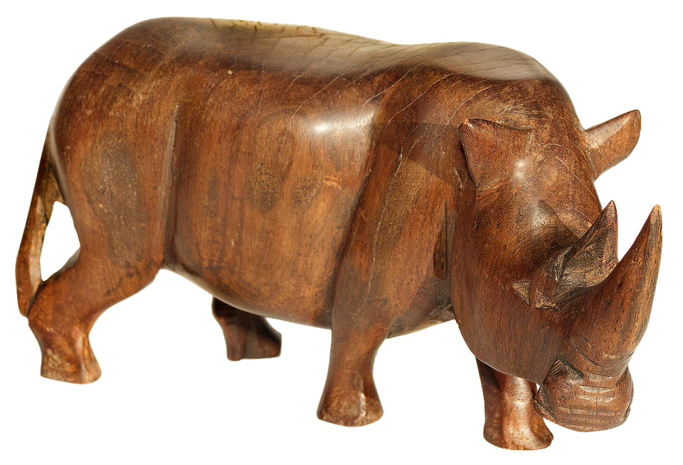 A Wood Carving Of A Rhinoceros