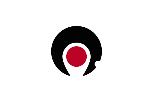 A Black Circle With Red And White Circle With A Point In The Center
