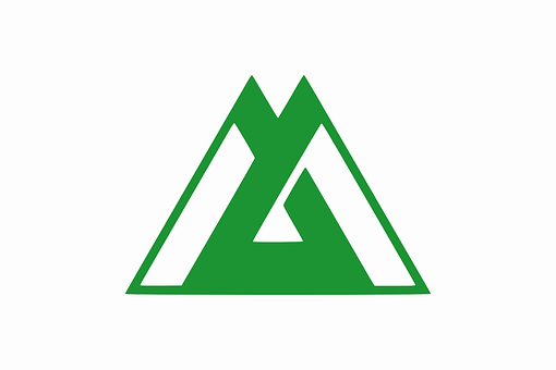 A Green Triangle With White Letters