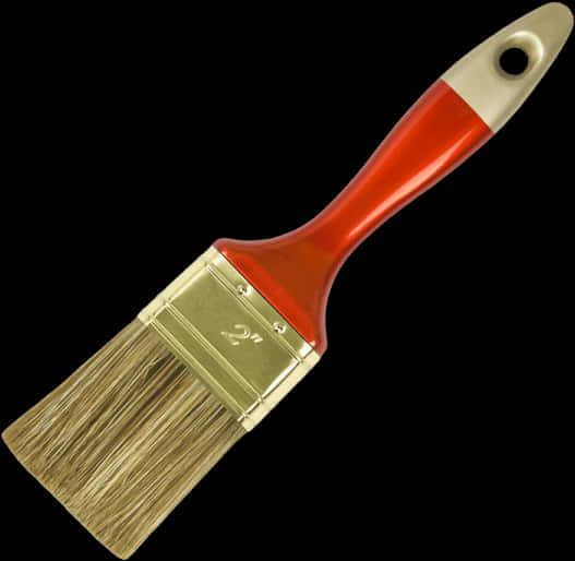 A Paint Brush With A Red Handle