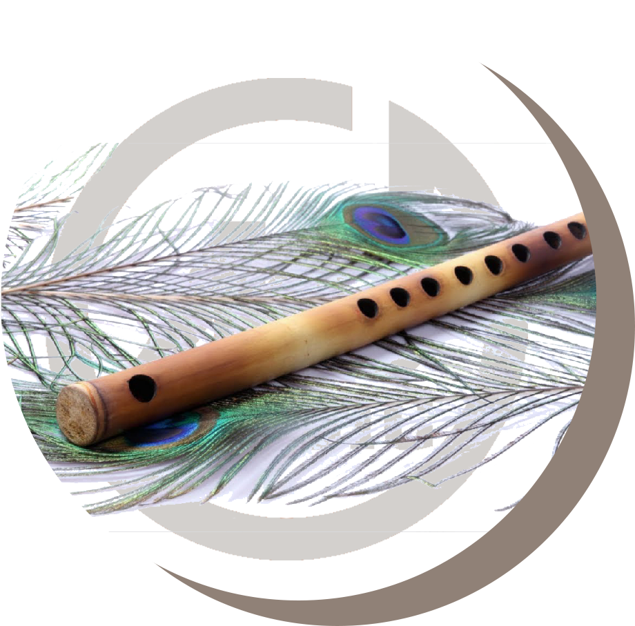 A Wooden Flute With Peacock Feathers