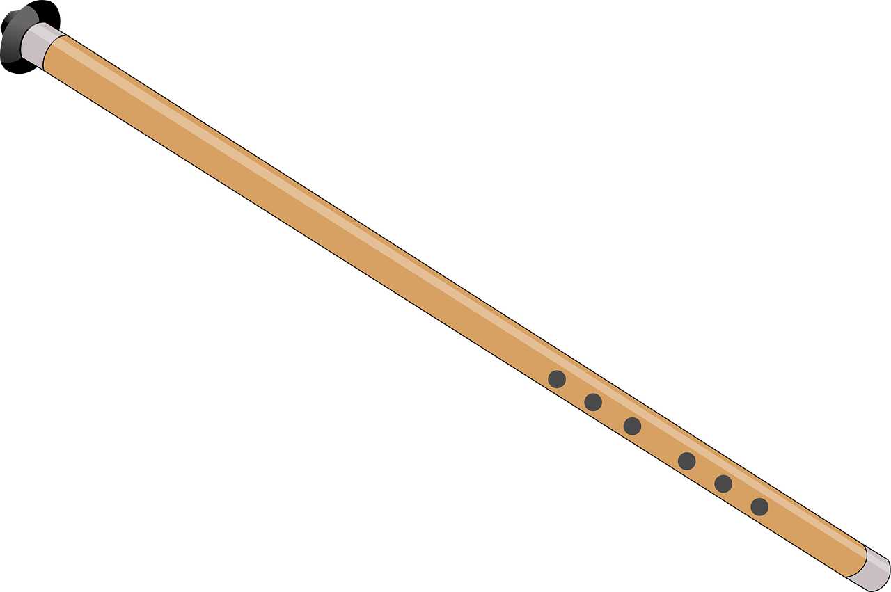 A Wooden Flute With Holes