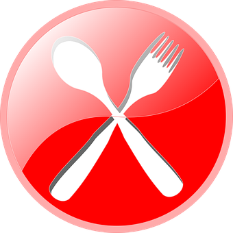 A Spoon And Fork On A Red Circle
