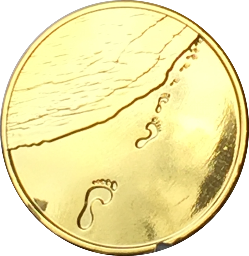 A Gold Coin With Footprints On It
