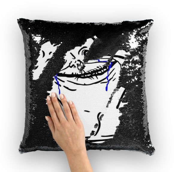 A Hand Touching A Black And White Pillow