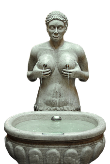 A Statue Of A Woman Holding Her Breasts