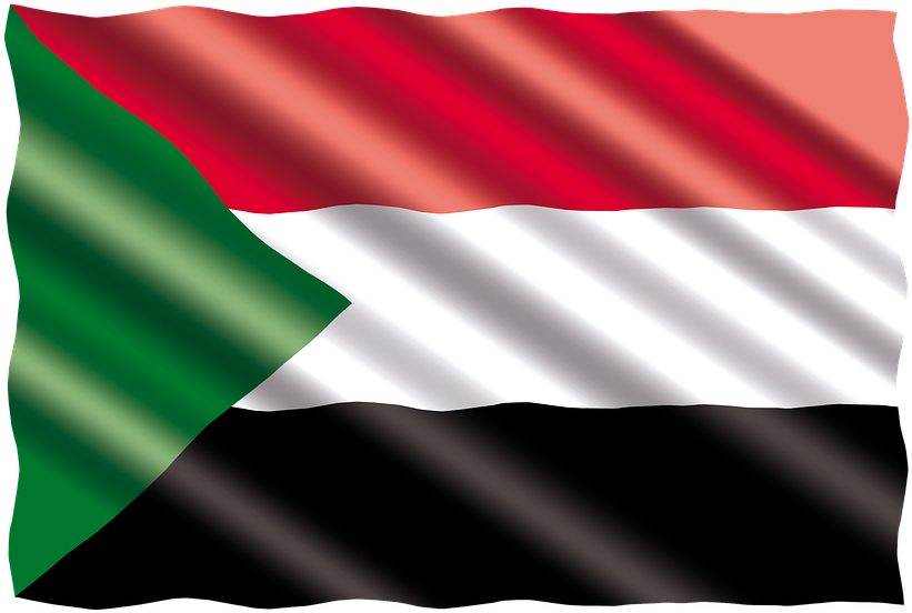 A Flag With A Green White And Black Triangle