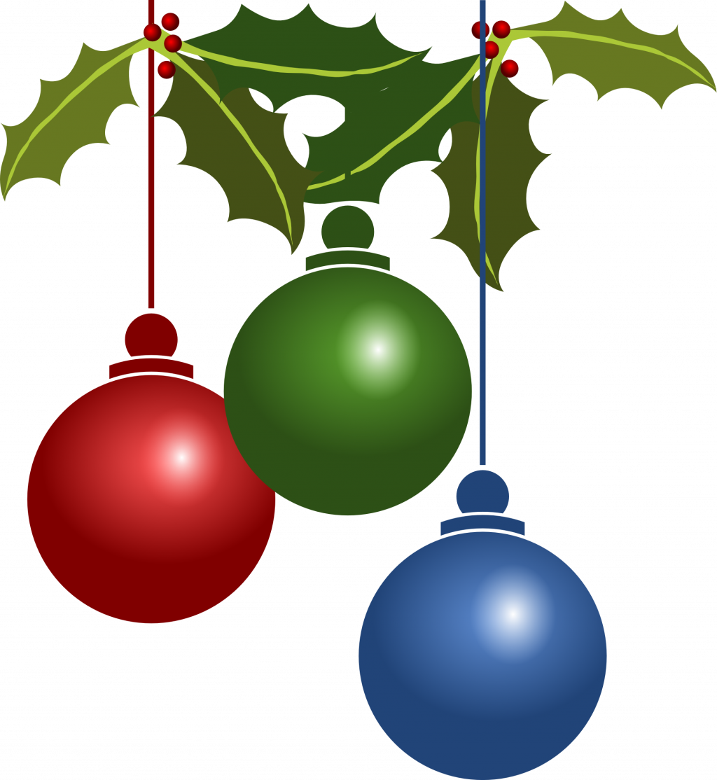 A Group Of Christmas Ornaments From A Branch