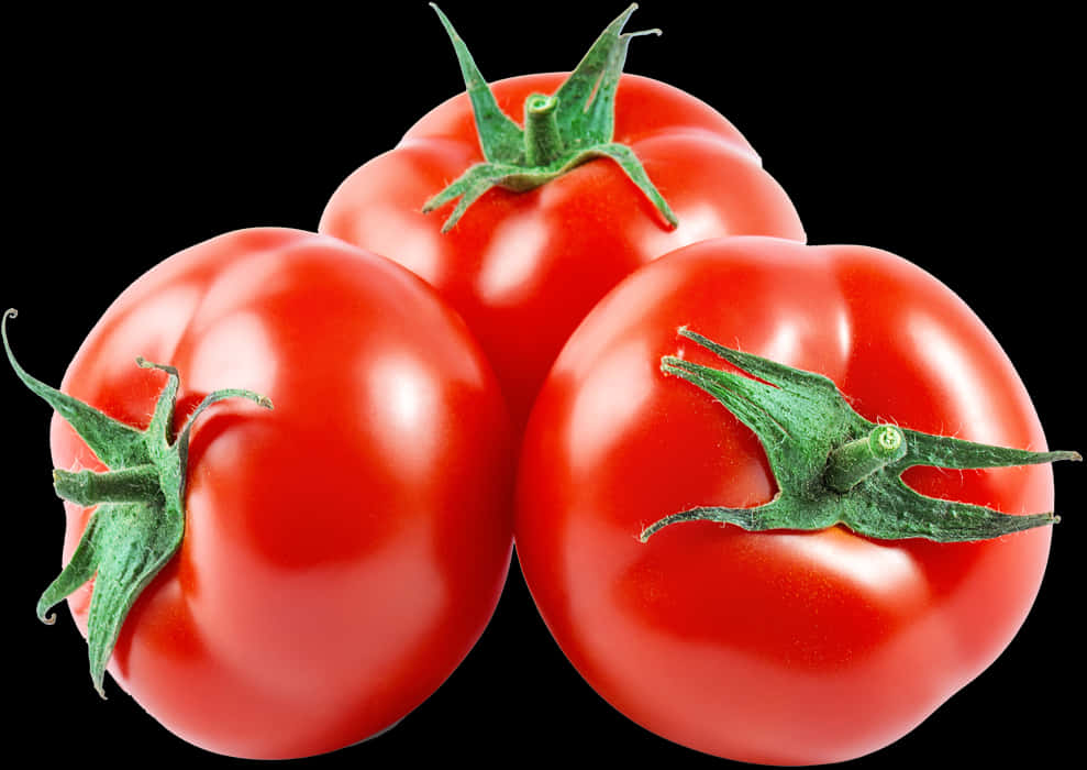 A Group Of Tomatoes With Green Stems