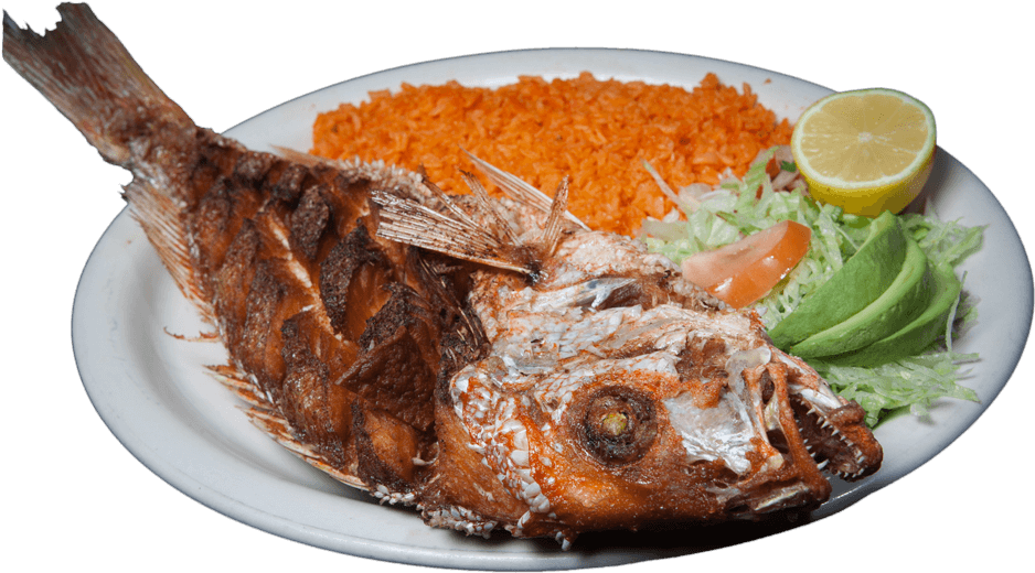A Plate Of Food With A Fish Head And Rice